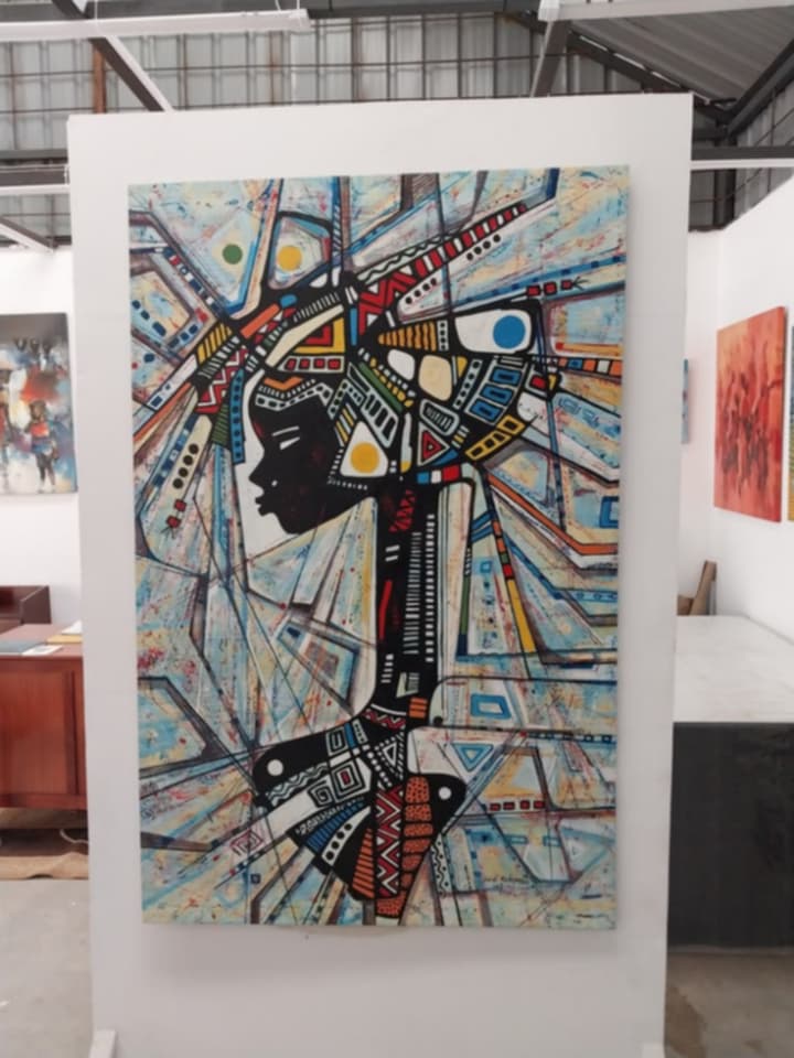 Visitor viewing a curated contemporary art collection at ARTSASA